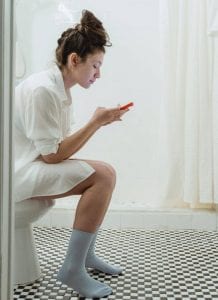 woman on toilet