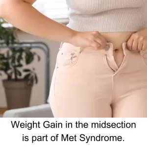 woman trying to button her pants