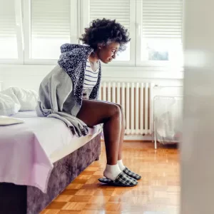 pain getting out of bed - older woman