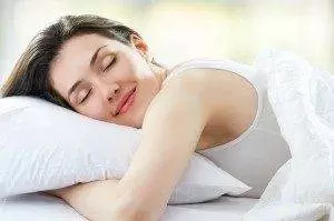 woman-sleeping-pillow-300x199