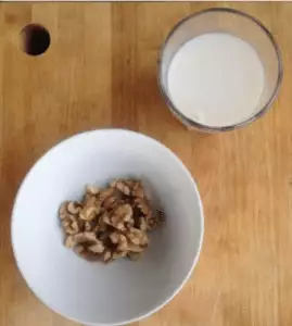 Handful of nuts and a small glass of milk before bed