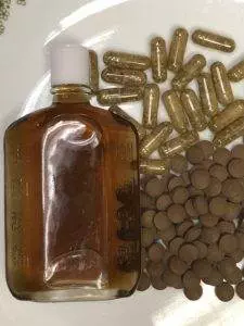 Chinese herb liniment and capsules