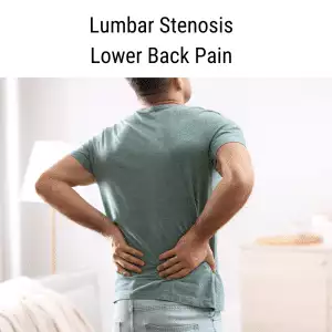 man holding his lower back in pain