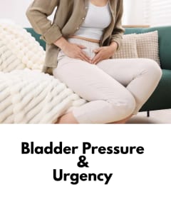 Woman holding pelvic area in discomfort due to incontinence